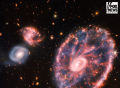 上新啦！韦布太空望远镜传回5亿光年外“车轮星系”高清照片